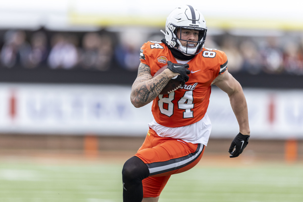 National tight end Theo Johnson of Penn State (84) runs after a catch during the first half of the 2024 Senior Bowl.